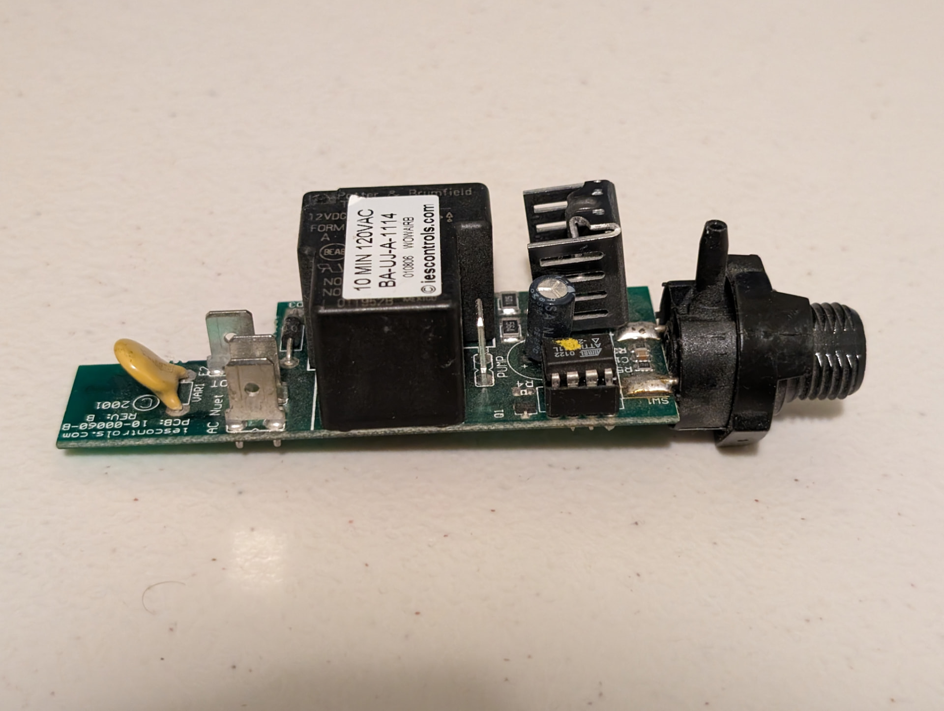 Mixed-signal relay control PCB with AVR microcontroller